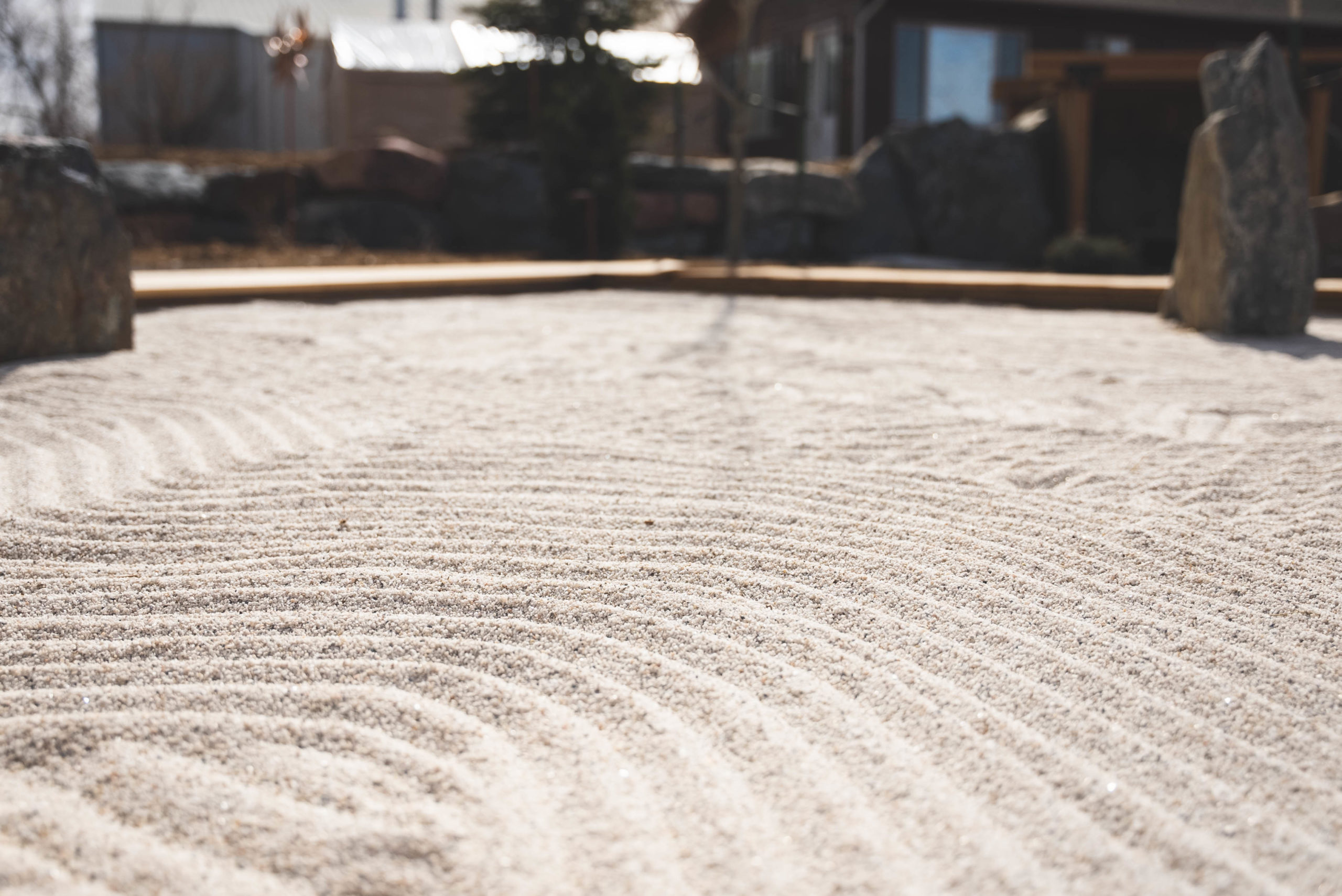 close up of white sand with lines in it