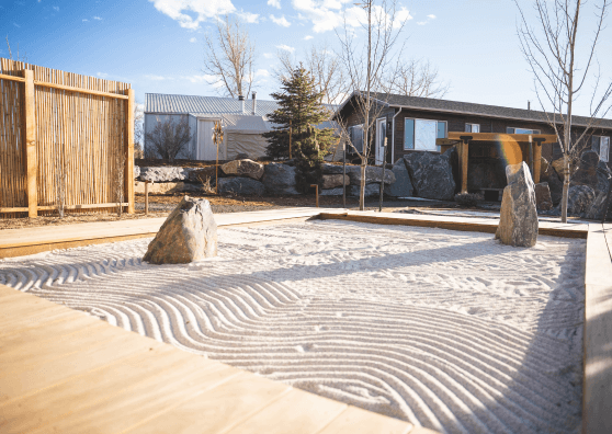 Sand zen garden with two large boulders