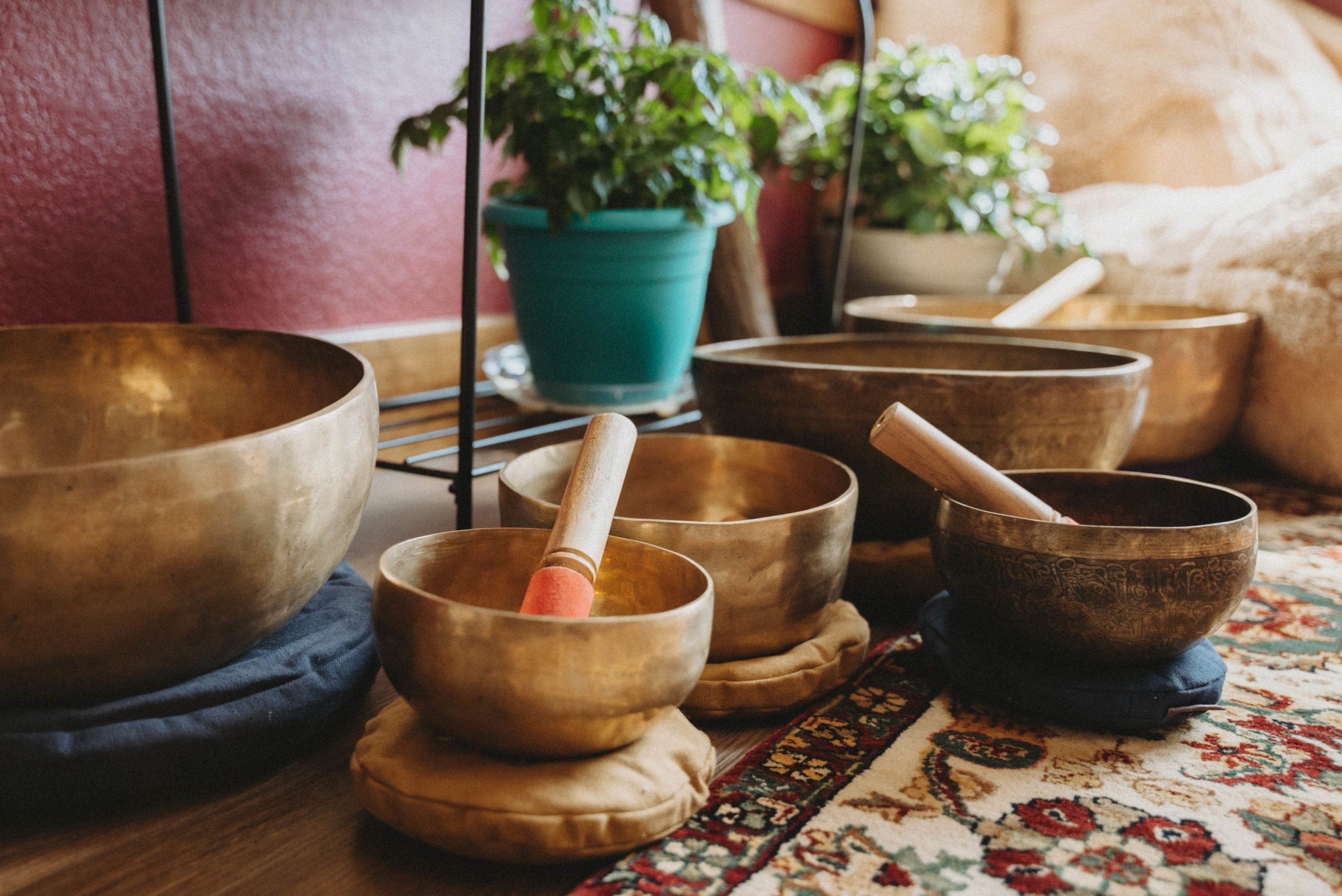 Gardens Spotlight: The Reflection Room Brass singing bowls on a floor